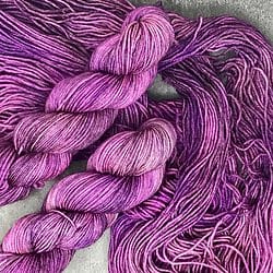 Shirsty Cat Designs BFL Sock Yarn - Purple Rain on a Raspberry Beret